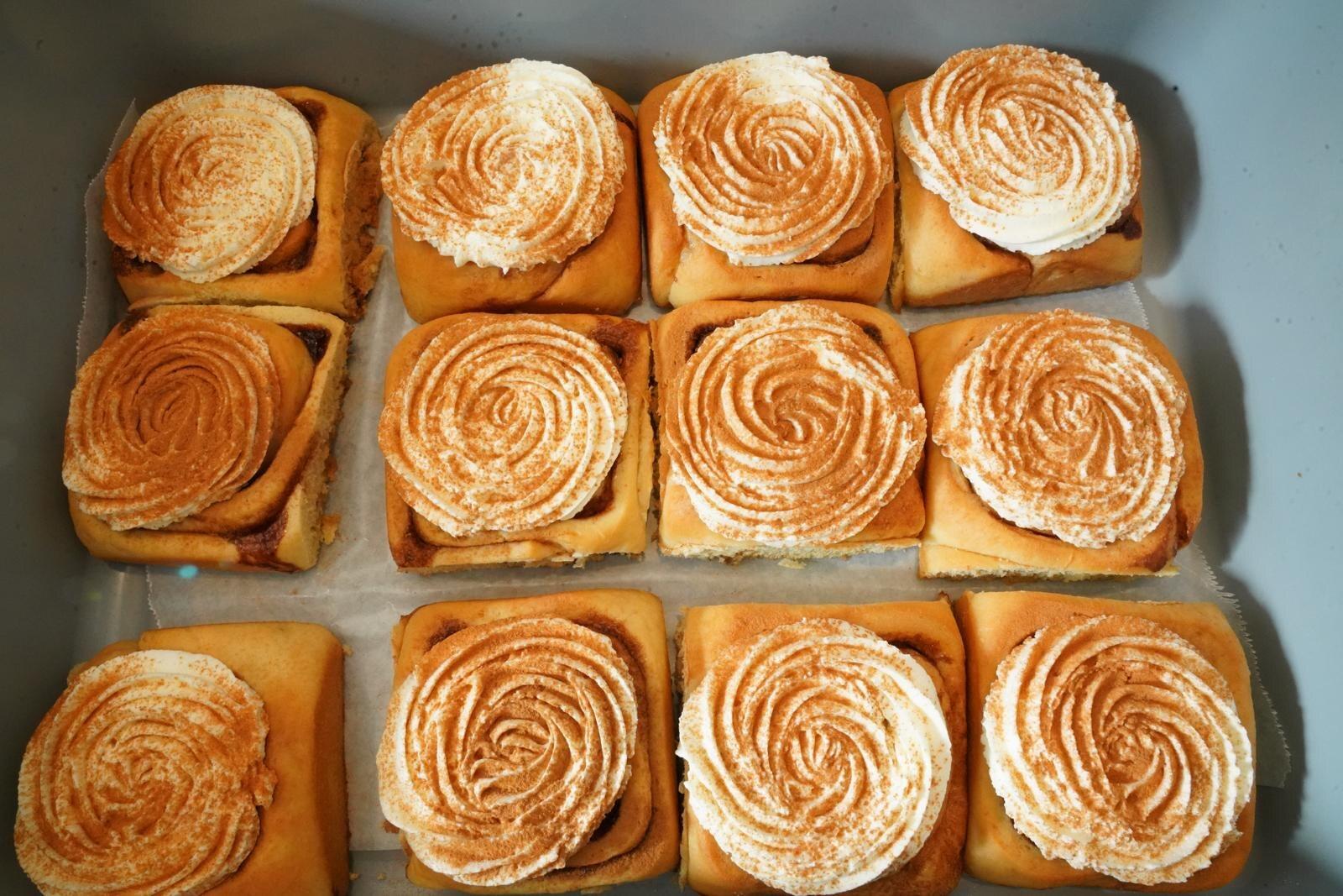 Tray of freshly baked cinnamon rolls at Isaiah Café